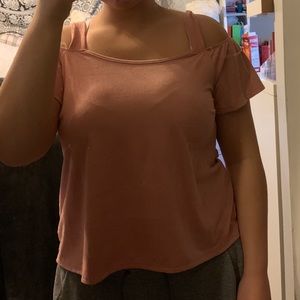 A pink two strapped shirt